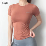 Load image into Gallery viewer, Peeli Women&#39;s Seamless Yoga Top | Short Sleeve Gym Shirt
